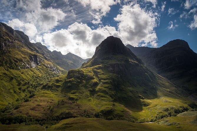 1 Day Loch Ness, Whisky, Glencoe & Scottish Highlands Tour - Fort William and Ben Nevis pass by the window