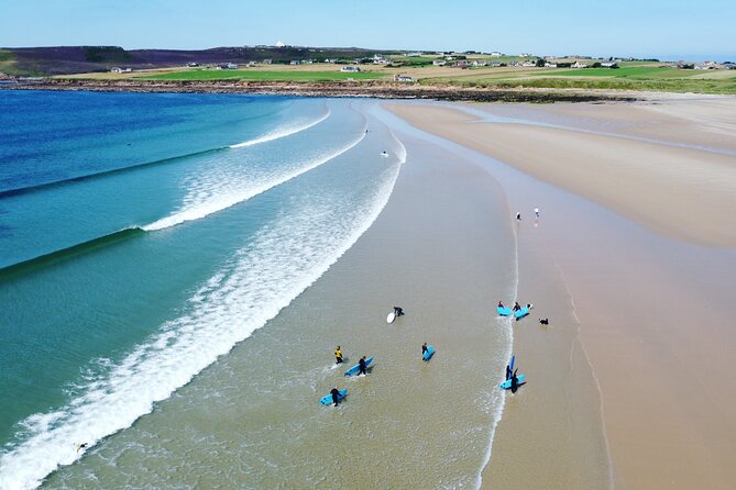 2 hour group lesson (3-16 people) - Learning to surf at Dunnet Beach
