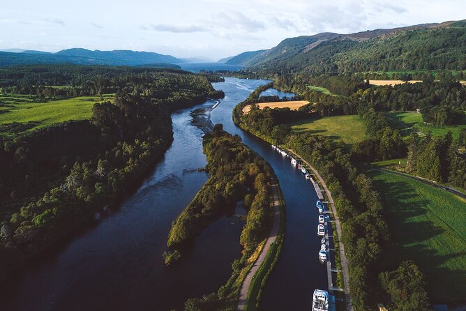 Caledonian Canal and Loch Ness Sightseeing Cruise - Aldourie Castle, Bona Lighthouse, and the bomber site
