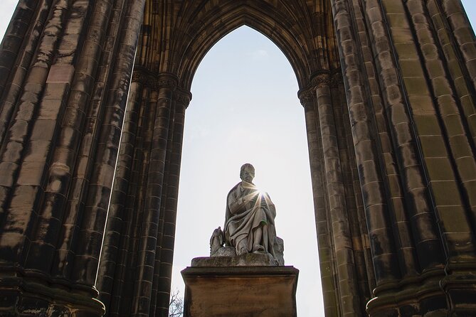 Edinburgh: Dean Village & New Town Walking Tour - George Street, statues, and the New Town grid