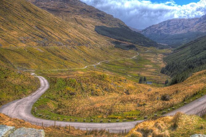 Full-Day Oban Castles and Glencoe Guided Tour from Glasgow - Loch Lomond begins the scenic sweep
