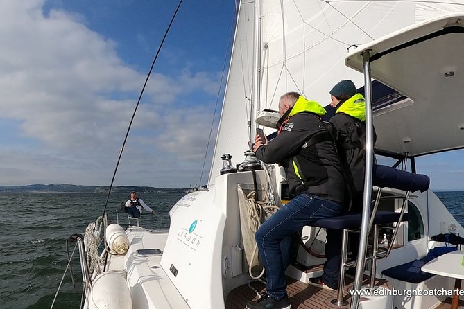 Half Day Sailing Trip - Taking the helm, or simply watching the water