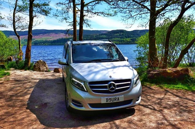 Loch Lomond & The Highlands Private Day Tour with Scottish Local - Cruising Loch Lomond beneath Ben Lomond