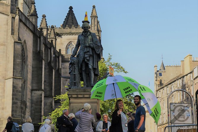 Old Town Walking Tour History and Tales in Edinburgh - Mercat Cross and stories of public Edinburgh