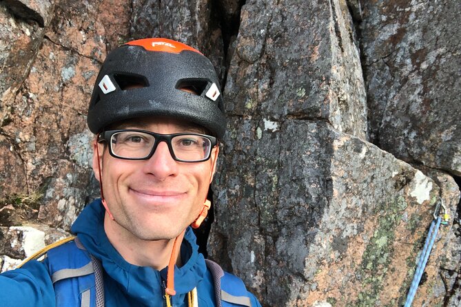 Private Guided Ridge Scrambling Experience in the Cairngorms - Harness, helmet, and rope below the cliffs