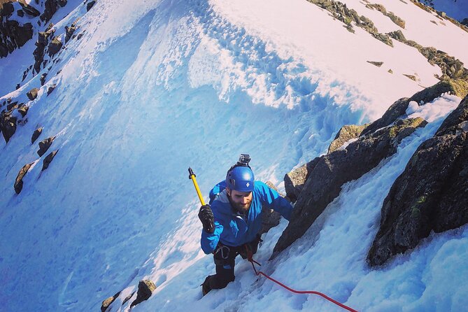 Private Guided Winter Mountaineering Experience in the Cairngorms - Harness, helmet, rope, and the climb
