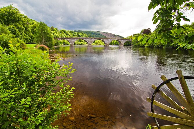 Scotland's Glens, Highlands & Whisky Day Trip from Edinburgh - Dunkeld Cathedral beside the River Tay